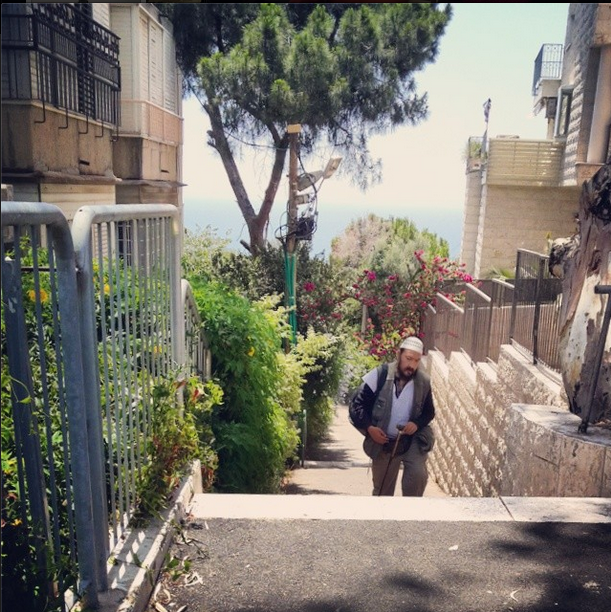 HaRav Yosef Dana steps with view of the Mediterranean, Haifa